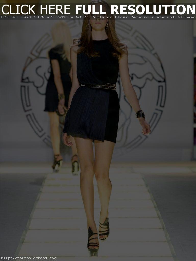 Models Modeling Versace Dresses And Skirts On The Fashion Runway