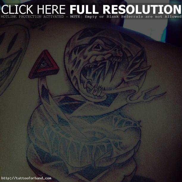 Chris Brown and Supposed Illuminati Ties With New Snake Back Tattoo