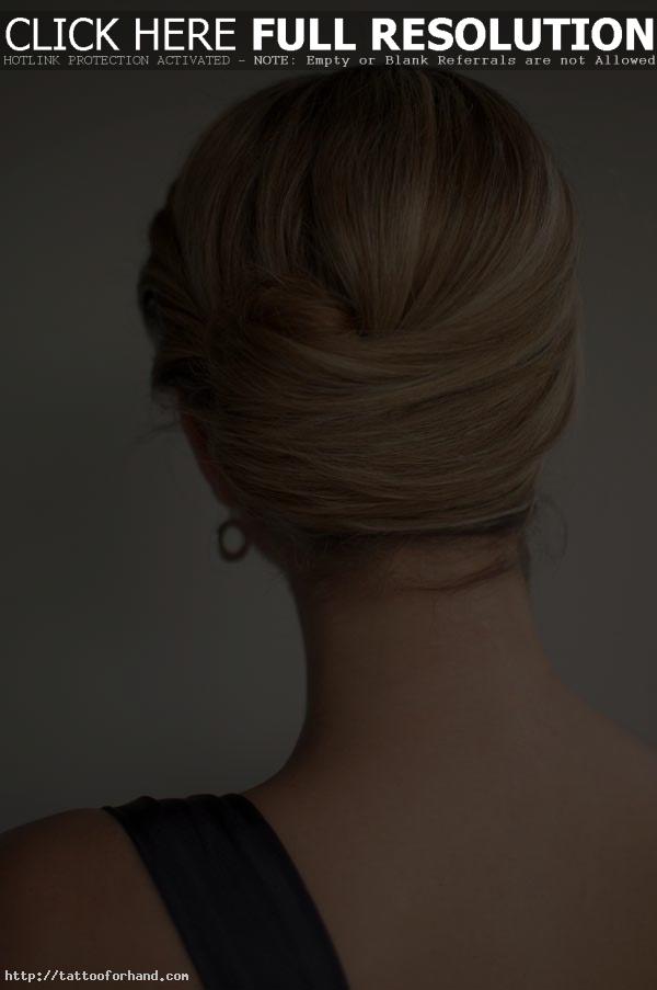 Twist on the classic French roll hairstyle